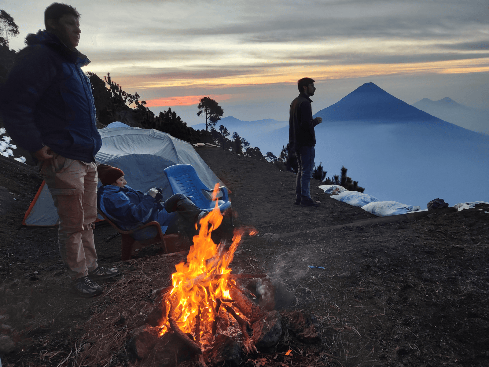A view of the three volcanoes Acatenango, Fuego, and Pacaya in Central America. Sunrise hikes to the summit are