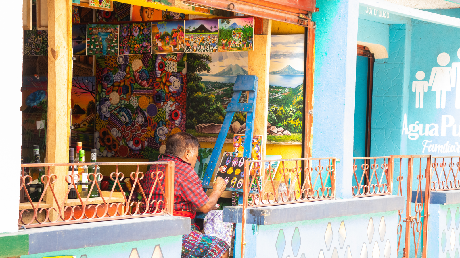 A boat ride around Lake Atitlan with surrounding volcanoes in the background