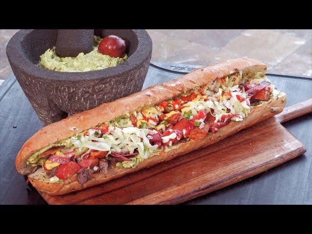 A Guatemalan shuco loaded hot dog